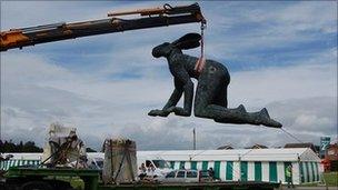 Sophie Ryder's bronze Crawling sculpture being unloaded at the Great Yorkshire showground in Harrogate