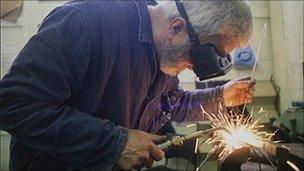 man welding