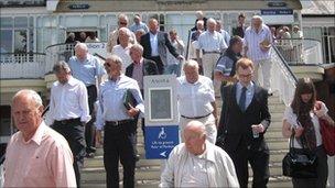 APS members leave the Ascot racecourse conference centre