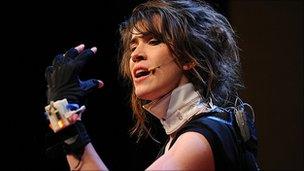 Imogen Heap wearing the gloves. Copyright James Duncan Davidson