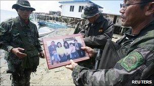 Family photo shown by police to reporters in Zamboanga city in the southern Philippines July 12, 2011