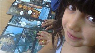 Jordanian girl reading a comic