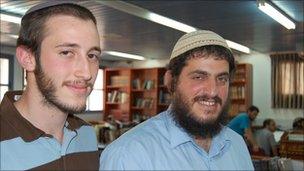 Rabbi Yehuda Amar (R) and student, Eliyahu Gross (L) in the Ra'anana yeshiva library.