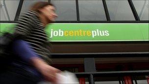 Woman walking past jobcentre