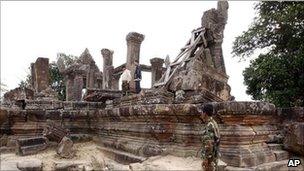 A Cambodian soldier stands near Cambodia's famed Preah Vihear temple.