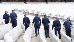 Police officers at the Olympic Stadium in Stratford, east London