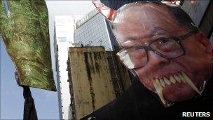 A defaced image of Li Ka-shing