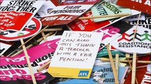 Abandoned pile of placards lie on the floor in central London following a one day national strike against pension changes and funding cuts to the public sector