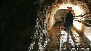 Man in mine tunnel