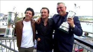 Rory McIlroy, Graeme Mcdowell and Darren Clarke with their trophies