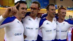 The GB men's team pursuit team celebrate gold