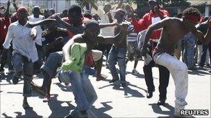 Protesters take to the streets of Malawi's commercial capital, Blantyre, on 20 July 2011