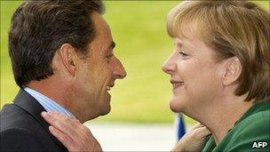 French President Nicolas Sarkozy and German Chancellor Angela Merkel in Berlin (20 July 2011)