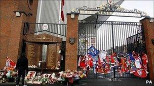 Fans have already paid their respects at Anfield by laying scarves and flowers