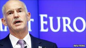 Greece's Prime Minister George Papandreou talks to media during a news conference at the end of an Eurozone leaders crisis summit in Brussels, 21 July 2011