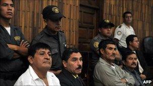 From left, in front row, Daniel Martinez, Carlos Carias, Manuel Pop and Reyes Collin wait in court during their trial in Guatemala City (25 July 2011)