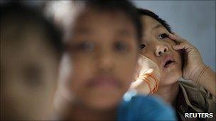 A refugee from Burma sits in class at a school in Kuala Lumpur