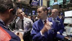 A file photograph of traders on the New York Stock Exchange