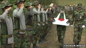 Remains of soldier being carried in a box during a ceremony in South Korea