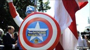 Tea party supporter protests against raising the debt limit