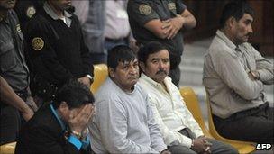 Carlos Antonio Carias Lopez, Daniel Martinez Martinez, Reyes Collin Gualip and Manuel Pop Sun (from left to right) during their trial on 1 August 2011