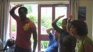 David and Tarah taking part in yoga at Elgin Resource Centre