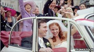 Bride and groom in car