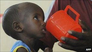 A Somali child is fed at an International Rescue Committee centre in Kenya