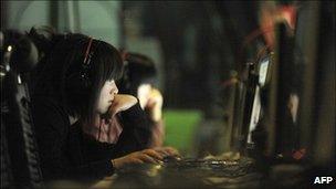 This photo taken on May 12, 2011 shows people at an internet cafe in Beijing