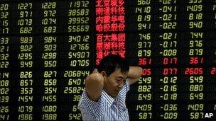 Chinese investor at stock exchange in Anhui province. 5 Aug 2011