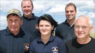 Paige Anderson (centre), Michael Anderson (right) and members of the Caister-on-Sea Lifeboat crew in Norfolk (Photo: Matt Sansom)