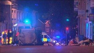 Police vans and firefighters in Bristol