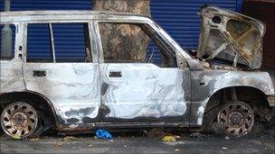 A burnt-out car in the Handsworth area