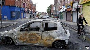 Burnt-out car on Lawrence Road in Liverpool