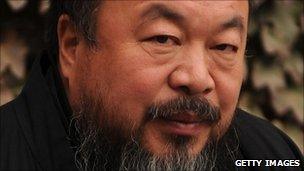 Chinese artist Ai Weiwei under house arrest in the courtyard of his home in Beijing (November 2010)