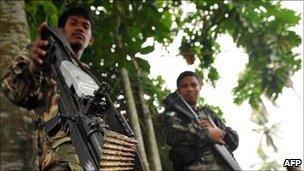 A file photo taken on September 19, 2009 shows members of the Moro Islamic Liberation Front (MILF) near Camp Darapanan in the town of Sultan Kudarat