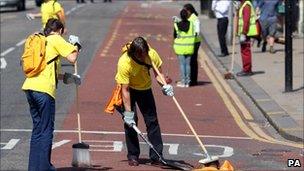 Volunteers help the clean-up effort in Croydon