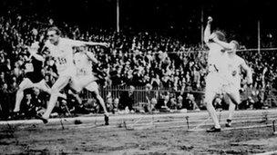 Harold Abrahams crosses the line to win the 100 metres at the 1924 Olympic Games in Paris.