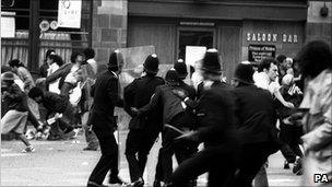 Police officers and rioters in Brixton, 1981