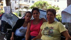 Revital Ben-Cohen (centre) and two other protesters