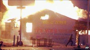 A building burning in the Los Angeles riots of 1992