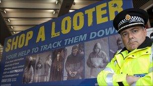 A shop a looter poster issued by police in Manchester