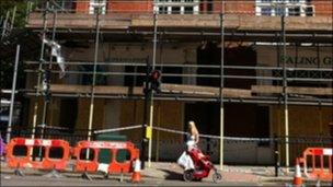 Shops boarded up in Ealing