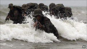 South Korean special warfare command soldiers perform a sea infiltration drill in Taean, South Korea on Tuesday