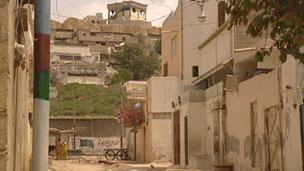 The Pashtun area, on the hill, viewed from streets in the Urdu-speaking area