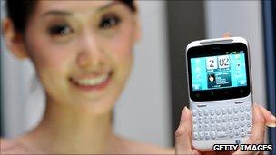 Model displays HTC phone