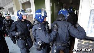 Met Police carry out a raid in London