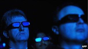 People wearing 3D glasses