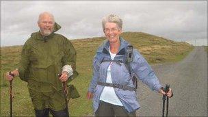 The Very Reverend Chris Potter and Sue Last tackle the elements on the walk