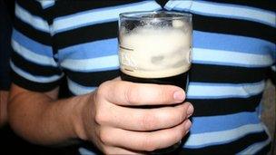 Man holding a pint